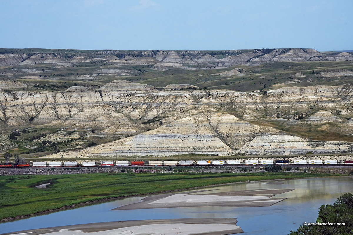 Aerial photograph of a BNSF freight train along the upper Missouri River